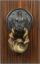Vente par "Tajan SVV" du 21/05/2001 - Marteau de porte tête de panthère et serpent (lot n°61)